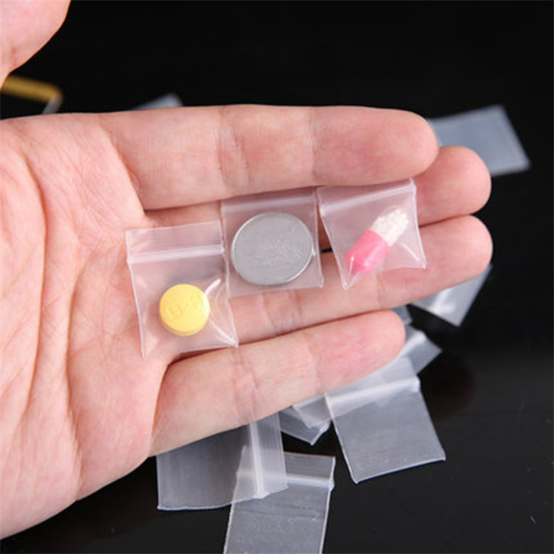 100Pieces Transparent Mini Sma - Body Jewelry Display recension och pris